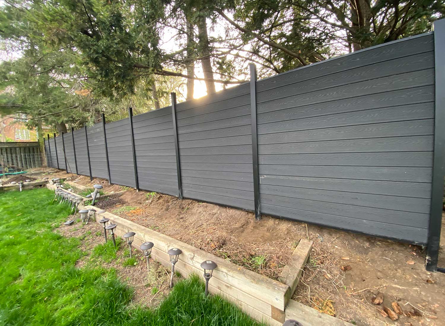 Composite-Fence-Privacy-fence-Dark-grey-Composite-Fence-Composite-Privacy-Fence-Woodgrain-Composite-Fence-installed-in-Toronto.jpg